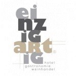 Das Logo von einzigartig - Hotel und Gastronomie GmbH