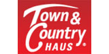 Das Logo von Town & Country Haus Lizenzgeber GmbH